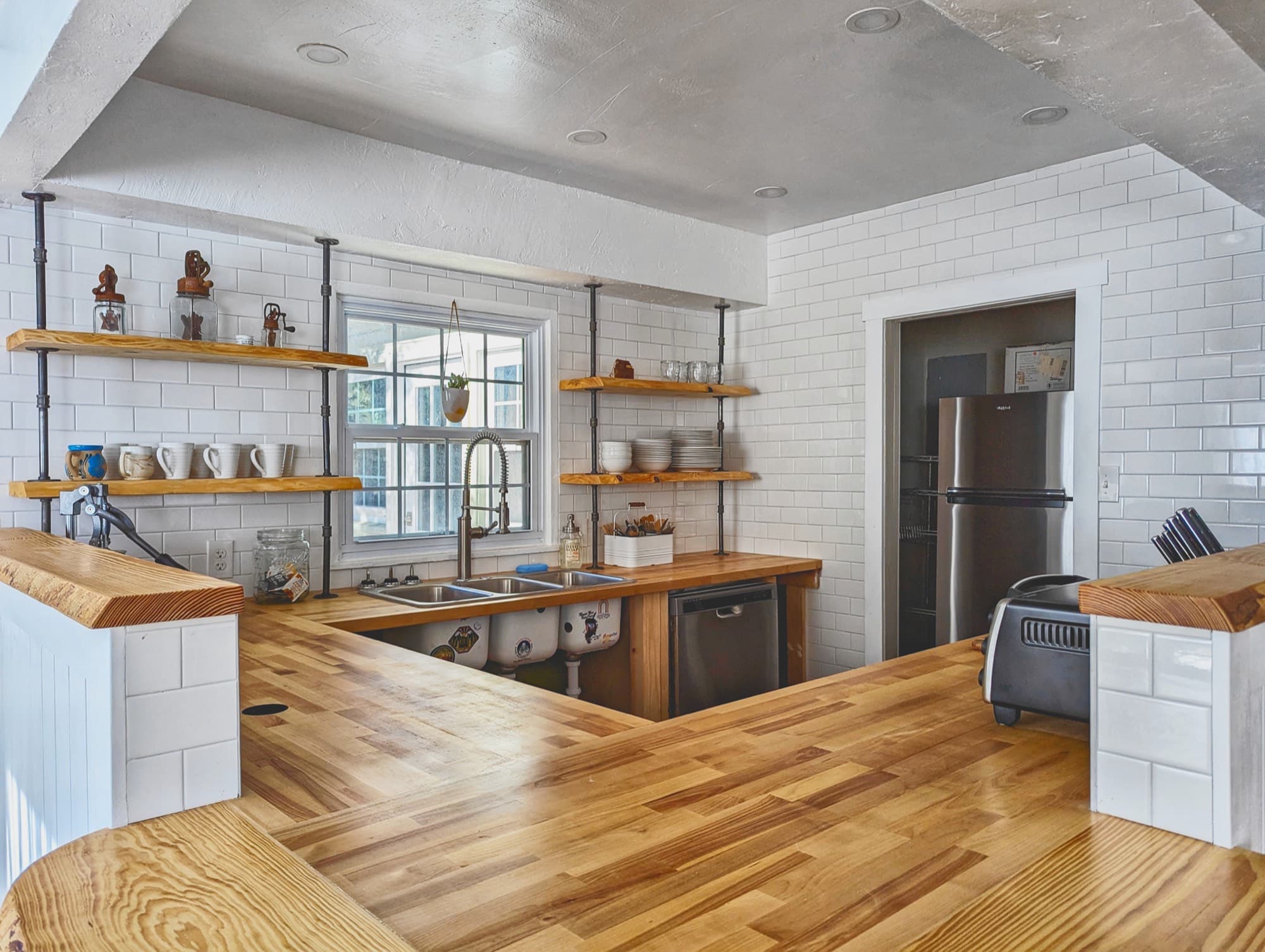 A full kitchen with table seating
